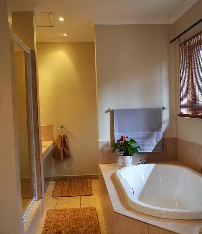 Bathroom with corner bath